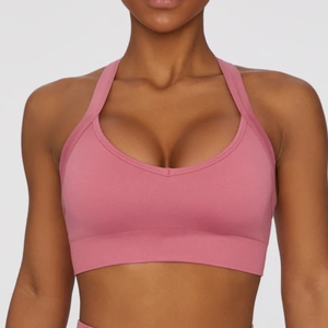 Close-up of dusty pink seamless sports bra with V-neckline and wide shoulder straps
