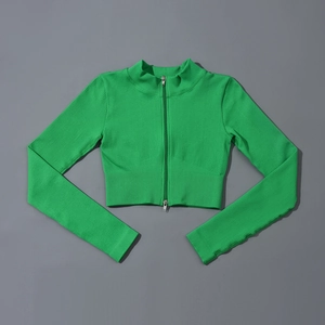 Gros plan sur la veste de yoga côtelée vert fluo avec double fermeture éclair