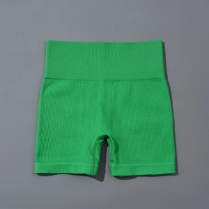 Vue détaillée de dessus d'un short de yoga sans couture vert vif à taille haute