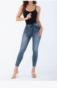 Detail of high-waist denim pants with front zipper body and classic 5-pocket styling