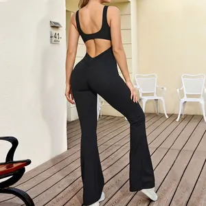 Women's black backless jumpsuit with scrunch butt lifting and stylish flared yoga pants