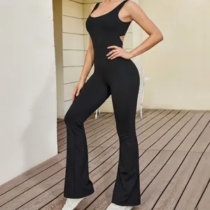 Women's black backless yoga jumpsuit with flared pants and ribbed elastic fabric