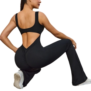 Women's backless flared yoga jumpsuit with wide straps and scrunch butt detail in black