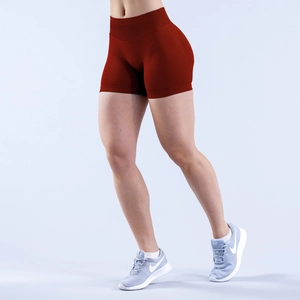 Detail of high-stretch seamless yoga shorts in dark red with scrunch butt lift design