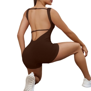 Seamless ribbed yoga bodysuit in coffee brown featuring an open back and strappy design