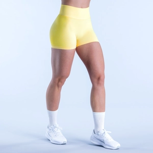 Dettaglio degli shorts da yoga senza cuciture a vita alta giallo chiaro con effetto push up