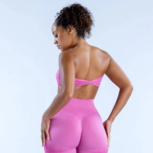 Ensemble de yoga rose avec brassière à nœud dorsal et legging à texture mouchetée dégradée