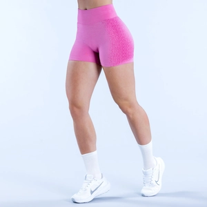 Dettaglio degli shorts da yoga rosa senza cuciture con vita alta e trama a rete traspirante