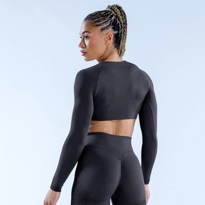 Women's deep black yoga set featuring long sleeve crop top and high waist leggings