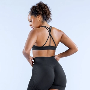Ensemble brassière de sport dos nu noire et legging de fitness moulant pour femme