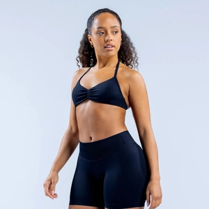 High-stretch halter neck sports bra and yoga shorts set in matte black finish
