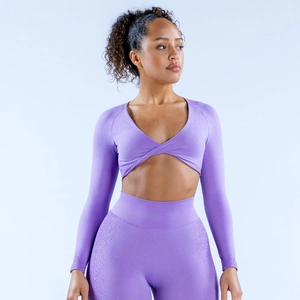 Detail of cross-front deep V-neck yoga crop top with breathable gradient texture in lilac