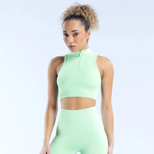 Detailed close-up of a mint green high-impact zipper sports vest with rib-knit finish