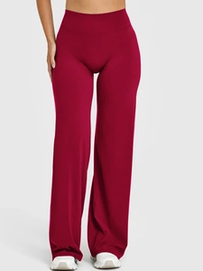 Detailed close-up of high-waisted wide-leg yoga pants in wine red showing fabric texture
