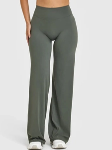 Macro detail of high waist wide leg yoga pants in moss green showing soft fabric texture
