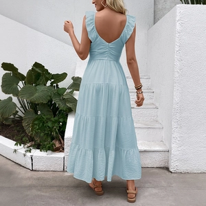 Light blue backless tiered maxi dress with V-neck and ruffled straps for summer beach