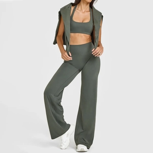 Three-piece olive green yoga set with high-waist flared pants and matching cardigan