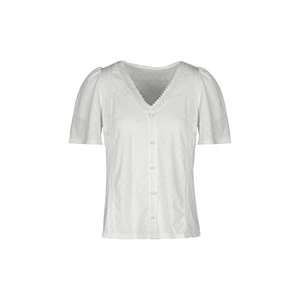 Detail of white cotton eyelet short sleeve blouse with V-neckline and lace embroidery