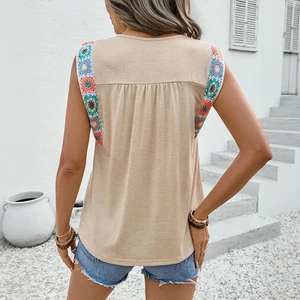 Beige boho sleeveless top with colorful crochet floral shoulders and pleated back
