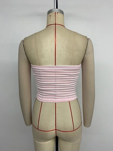 Detail view of the back of a pink and white striped knitted strapless crop top