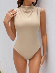 Detail showing the ribbed knit texture and high neck of this sleeveless beige bodysuit