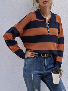 Detail shot of the striped long sleeve knit polo shirt featuring buttoned lapel and ribbed cuff