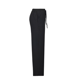 Detail of black wide-leg trousers showing elastic drawstring waist and vertical pleated texture