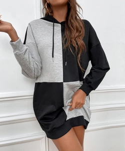 Detail of grey color block hoodie dress featuring dropped shoulders and ribbed cuffs