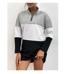 Close-up of color block sweatshirt with quarter-zip standing collar and soft texture