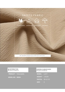 Detail of breathable safety fabric texture on beige trousers with quality specifications