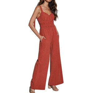 Orange summer jumpsuit with spaghetti straps, V-neck, smocked waist, and wide leg pants