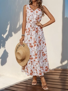 Detailed view of bohemian floral maxi dress with V-neck, lace trim and adjustable drawstring