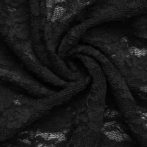 Detailed macro view of the intricate floral lace texture and mesh of a black camisole