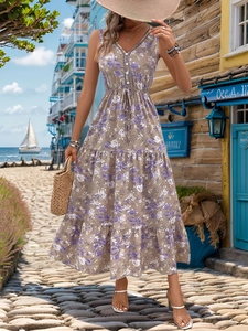 Floral print sleeveless midi dress with button front and drawstring waist in a resort setting