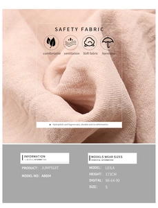 Macro shot of breathable pink smocked jumpsuit fabric with model sizing details