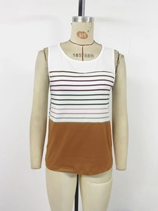 Close-up of sleeveless summer top featuring colorful stripes and white knit contrast