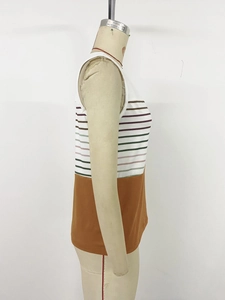 Close-up of side view showing colorful striped stitching and caramel knit fabric
