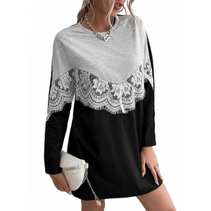 Women's crewneck gray and black dress with decorative white lace patchwork design