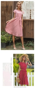 Detail of French vintage pleated midi dress with polka dot pattern and waist tie belt