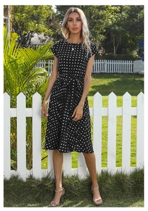 Detailed view of the French retro polka dot dress featuring a drawstring waist and soft pleats