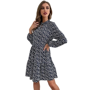 Floral long sleeve mini dress with tiered skirt and keyhole high neck detail