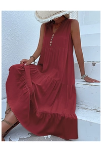 Detail of V-neckline and button front on a sleeveless tiered wine red maxi dress
