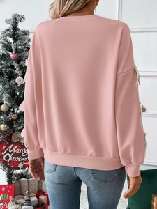 Pink crewneck sweatshirt for women with bow-tie sleeve details and festive holiday style