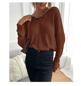 Detail of V-neck knitted sweater featuring black lace trim and loose long sleeves
