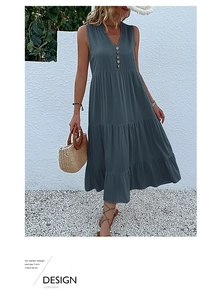 Detail of V-neck sleeveless dress with buttons and tiered skirt in dark gray blue