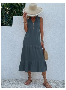 Detail of grey-blue summer V-neck sleeveless tiered maxi dress with wooden buttons