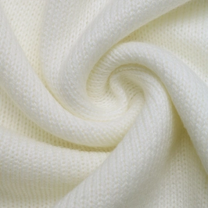 Close-up of premium cream heart sweater knit fabric texture with soft fiber details
