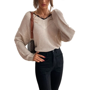 Women's V-neck knit sweater with black lace trim and hollow crochet details in beige