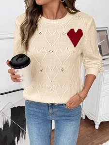 Women's cream knit sweater with red heart patch and diamond hollow knit texture