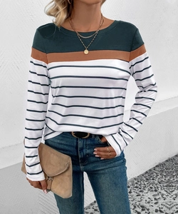 Detail of color-block striped long sleeve shirt with crew neck and ribbed texture